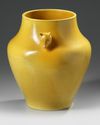 A CHINESE MUSTARD YELLOW GLAZED VASE WITH DEAR HANDLES