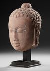 A BUDDHA HEAD, GUPTA PERIOD  (4TH–6TH CENTURY AD)