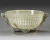 A CHINESE CELADON JADE 'POETIC' TWIN HANDLED BOWL, QING DYNASTY (1644-1911)