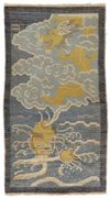 A CHINESE DRAGON AND FISH RUG, 20TH CENTURY
