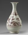 A Chinese Ming-style underglaze copper red 'phoenix' pear-shaped vase, yuhuchunping