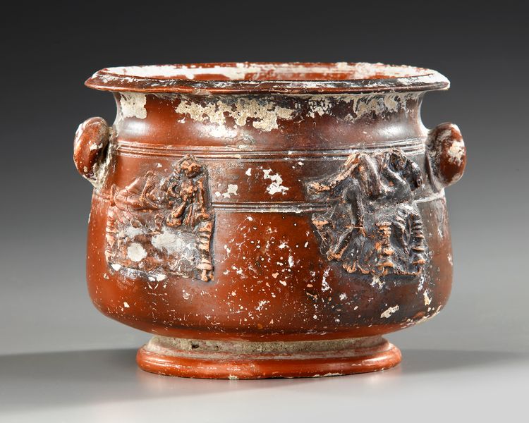 A ROMAN RED CLAY BOWL WITH EROTIC SCENES, CIRCA 1ST-2ND CENTURY A.D.