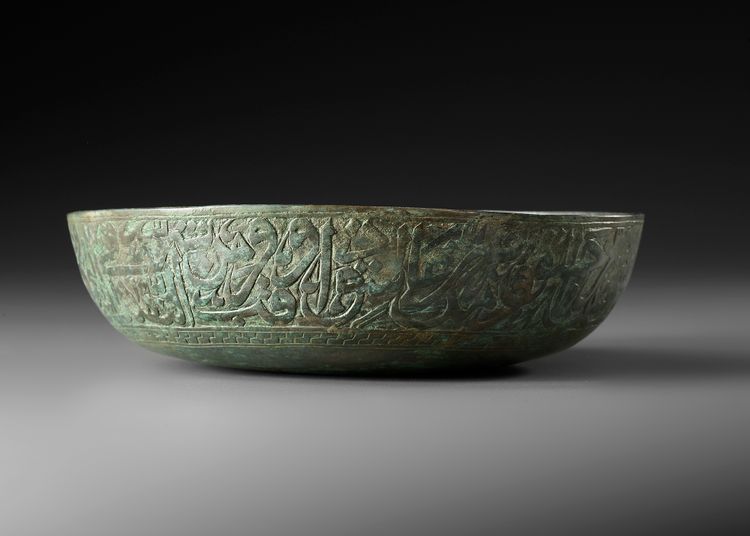 A CAST BRONZE MAGIC BOWL, 17TH CENTURY