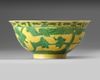 A CHINESE YELLOW-GROUND GREEN GLAZED 'BOYS' BOWL, 19TH-20TH CENTURY