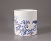 A Chinese blue and white and underglaze red brush pot, bitong