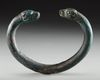 AN URARTIAN BRONZE BRACELET WITH DECORATED FINIALS, CIRCA 9TH-6TH CENTURY B.C.