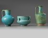 Two Islamic turquoise glazed jugs and a bowl