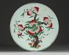 A Chinese famille rose 'nine peaches' charger