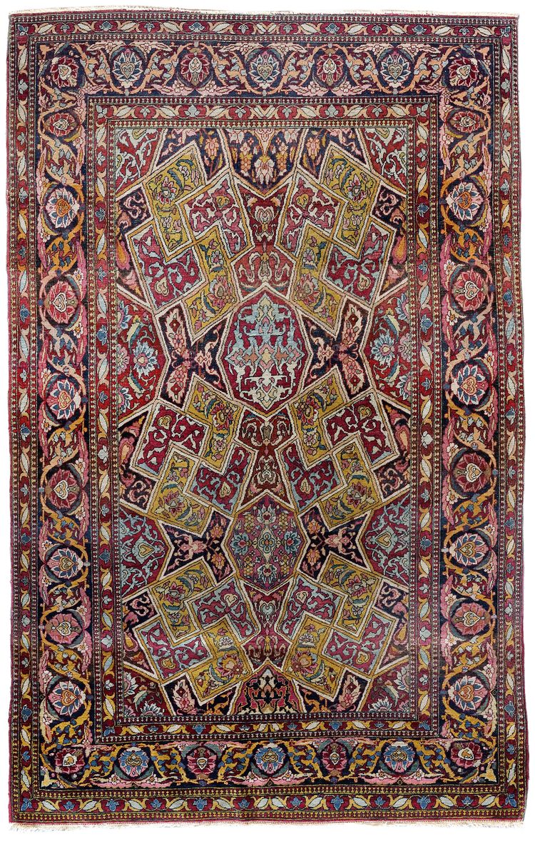 AN AHMAD ISFAHAN RUG WITH UNUSUAL DESIGN