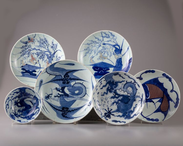 Five Chinese blue and white dishes and a bowl