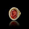 A ROMAN PORTRAIT INTAGLIO OF 'AELIUS' 2ND CENTURY AD, MOUNTED IN A 20 CENTURY GOLD RING, 18K WITH DIAMOND