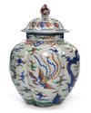 A CHINESE WUCAI LOBBED JAR AND COVER