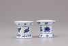 A pair of blue and white porcelain pounces
