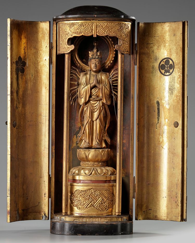 A kannon statue in a zushi shrine