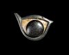 AN ANCIENT CARVED STEATITE EYE OF SEPARATE PARTS, 2000 BC