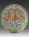 A massive Chinese famille rose 'dragon and phoenix' charger