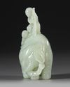 A CELADON JADE CARVING OF TWO BOYS WASHING AN ELEPHANT, 19TH CENTURY