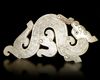 A LIGHT GREEN JADE 'S' DRAGON PENDANT, CHINA, HAN DYNASTY (206 BC-220 AD)