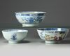 Two Chinese blue and white bowls and a famille rose bowl