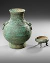 A CHINESE BRONZE RITUAL HU VASE, HAN DYNASTY (206 BC-220 AD) OR LATER