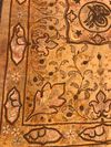 AN EMBROIDERED HANGING PANEL