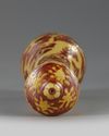 A CHINESE IRON-RED AND YELLOW-ENAMELLED 'DRAGON' BRUSH HANDLE, QING DYNASTY (1644-1911)