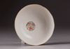 A pair of Chinese famille rose 'butterfly and flower' bowls