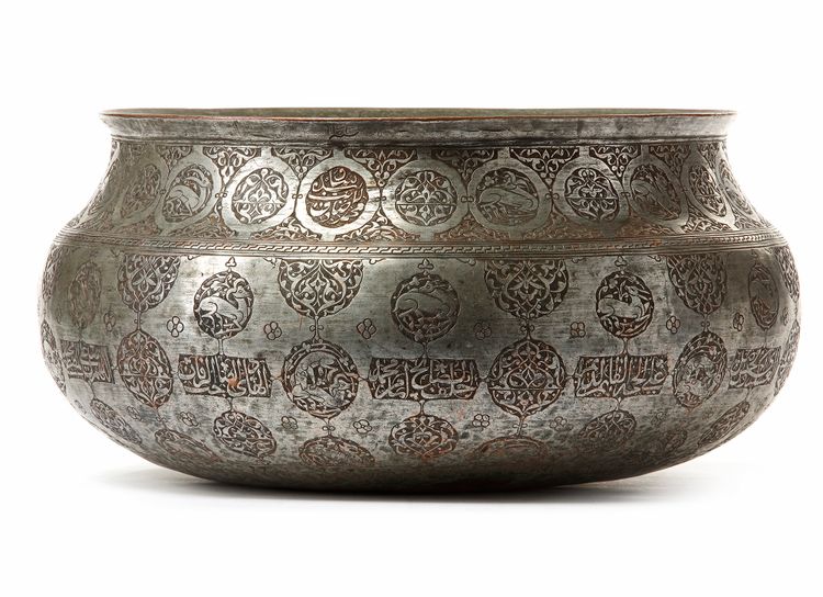 A SAFAVID TINNED-COPPER BASIN SIGNED MUHAMMAD SADIQ, IRAN, 16TH-17TH CENTURY