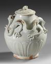 A CHINESE WHITE-GLAZED DRAGON JAR AND COVER,SONG DYNASTY (960-1279)