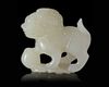 A CHINESE JADE CARVED BUDDHIST LION, 20TH CENTURY