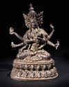 A SINO-TIBETAN BRONZE FIGURE OF THREE-HEADED SEATED BODHISATTVA