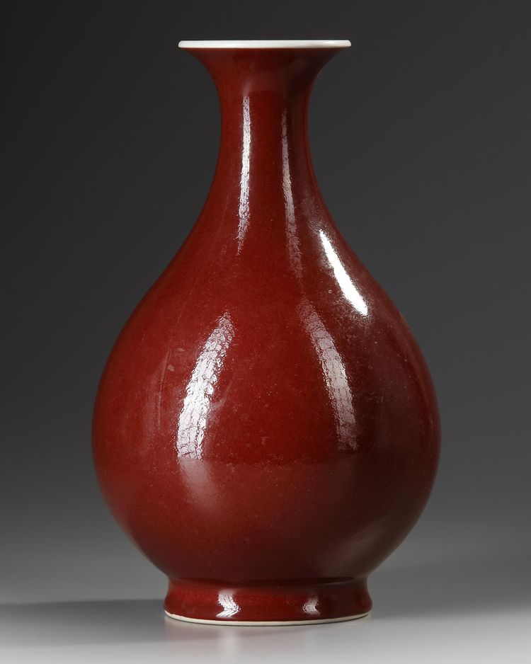 A CHINESE COPPER-RED-GLAZED PEAR-SHAPED VASE, YUHUCHUNPING, DAOGUANG SIX CHARACTER SEAL MARK IN UNDERGLAZE BLUE AND PROBABLY OF THE PERIOD (1821-1850)