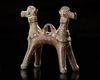 A BRONZE DOUBLE HEADED MYTHOLOGICAL ANIMAL, LURISTAN PERIOD, 1ST MILLENNIUM BC