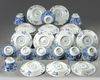 Ten sets of Chinese blue and white foliate rimmed cups and saucers