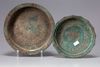 Two Islamic bronze dishes