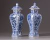 Two Chinese blue and white vases with covers
