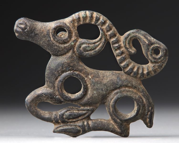 A LARGE SCYTHIAN BRONZE APPLIQUE OF AN ANTELOPE, 600 BC