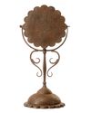 A GILT DECORATED METAL MIRROR HOLDER