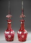 PAIR OF ANTIQUE RUBY RED GLASS DECANTERS, 19TH CENTURY
