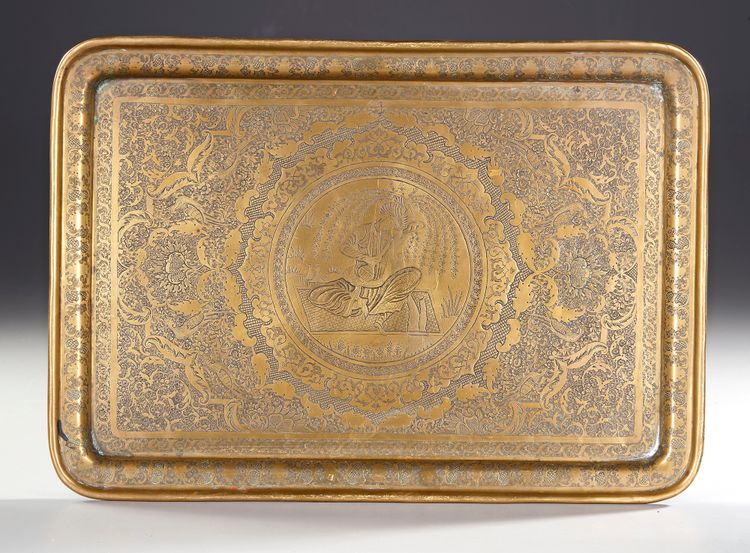 A QAJAR ENGRAVED BRASS TRAY, PERSIA 19TH CENTURY