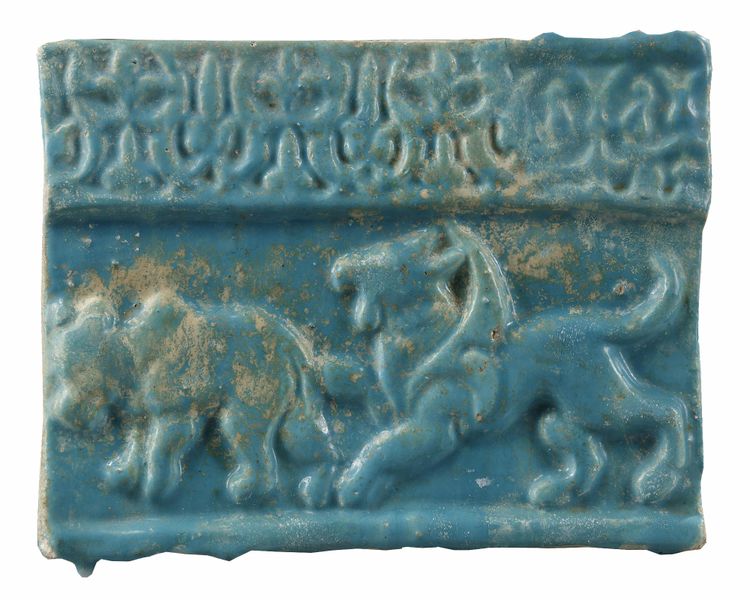 AN ISLAMIC KASHAN TURQUOISE GLAZED TILE, PERSIA, 13TH-14TH CENTURY