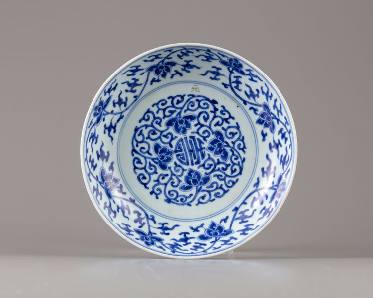 A Chinese blue and white ‘scrolling lotus’ dish