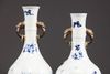 Two similar moulded Chinese blue and white twin-handled vases