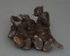 A FINE JAPANESE BRONZE OBJECT 置物 DEPICTING KANZAN 寒山 (HANSHAN) AND JITTOKU 拾得 (SHIDE), MEIJI PERIOD (1868-1912)