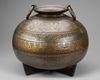 A LARGE CARVED BRASS VESSEL, MOROCCO, 16TH CENTURY