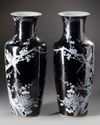 A pair of Chinese black-ground enamelled 'magpie and prunus' vases