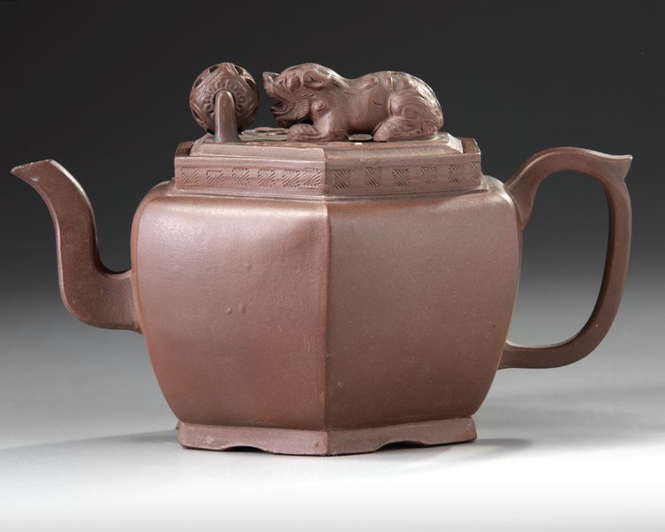A Chinese Yixing hexagonal teapot and cover