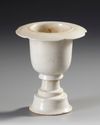 A CHINESE WHITE-GLAZED CERAMIC STEM CUP,SONG DYNASTY (960-1279)