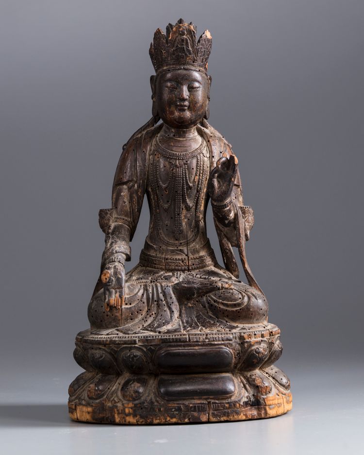A Chinese wooden carving of Avalokitesvara