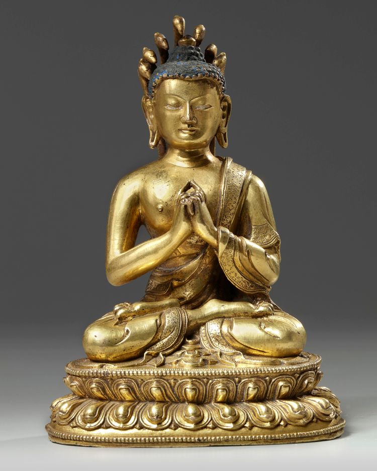 A Tibetan gilt bronze figure of an Amitayus